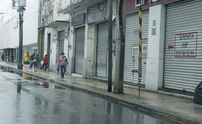 Domingo caluroso con lluvias intensas por la tarde