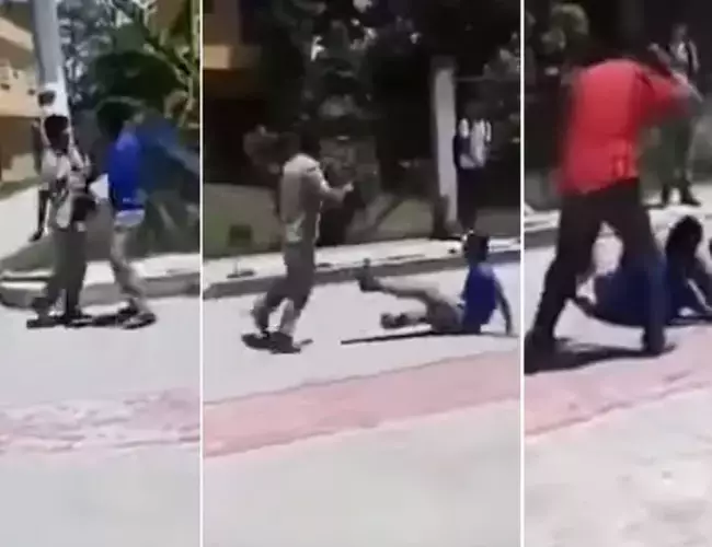 (VIDEO) A 'cinturonazos' maestro separa pelea de alumnos