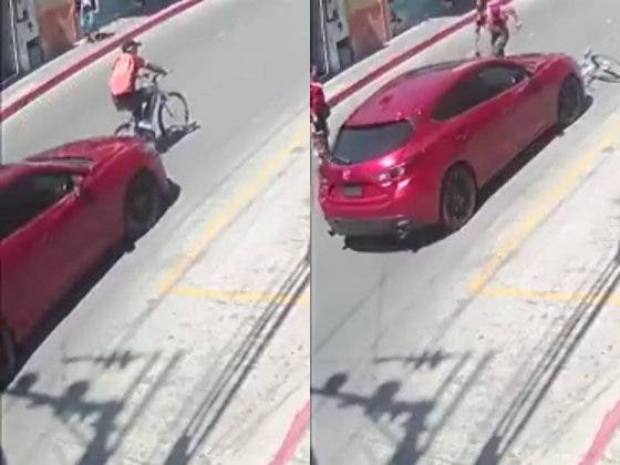 (VÍDEO) Automovilista embiste a ciclista y exige que le paguen los daños