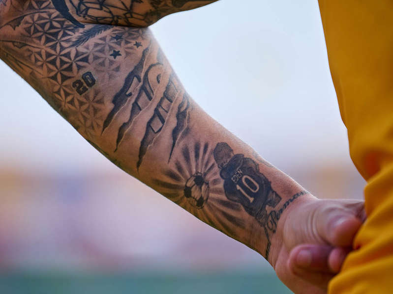China: Prohíben a deportistas tatuajes; si los tienen, piden que los borren