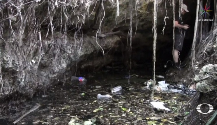 Al año, extraen al menos seis toneladas de basura en cenotes de Yucatán