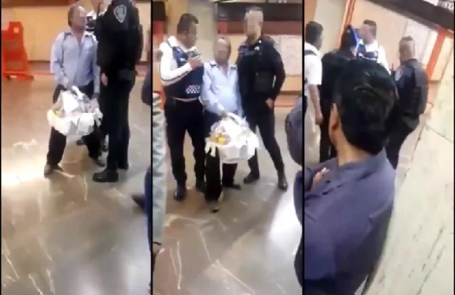 Policías intentan detener a vendedor de dulces en el Metro en Pantitlán